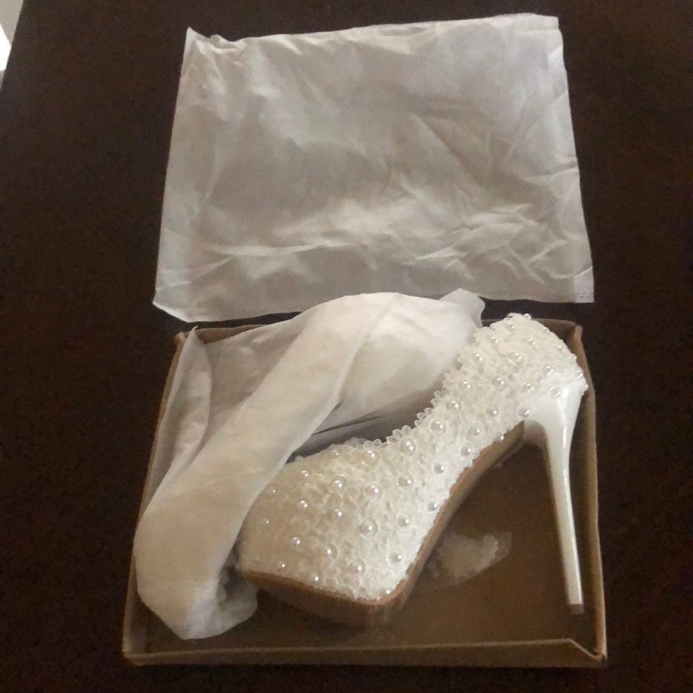 Beautiful white with pearls high heels